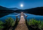 pexels photo 414612 414612 Discover tranquility at a moonlit dock in Whistler, BC, under a starry sky.